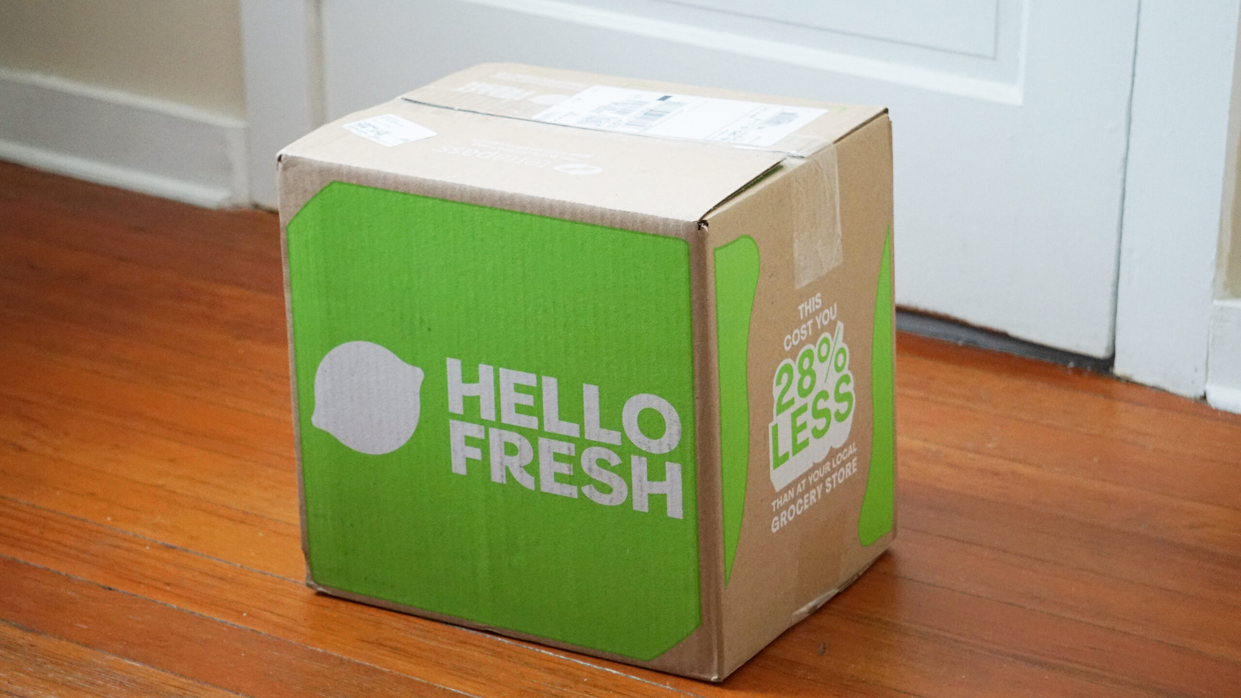 HelloFresh meal kit delivery box arriving on time with insulated packaging to keep ingredients fresh