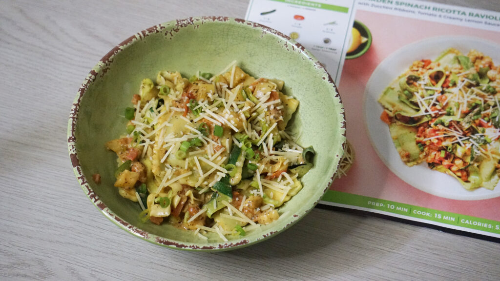 HelloFresh garden spinach ricotta ravioli with zucchini, tomato, lemon cream sauce, and Parmesan