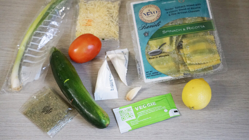 HelloFresh Garden Spinach Ricotta Ravioli ingredients including ravioli, zucchini, tomato, lemon, and Parmesan
