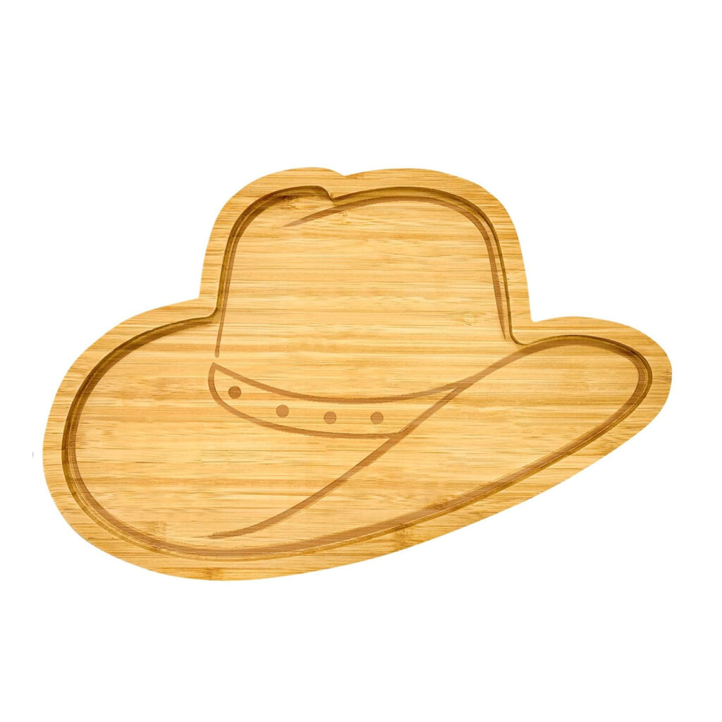 Michael Jackson hat–shaped wooden charcuterie board used for serving fruit and snacks at a Michael movie night inspired by his reported favorite foods.
