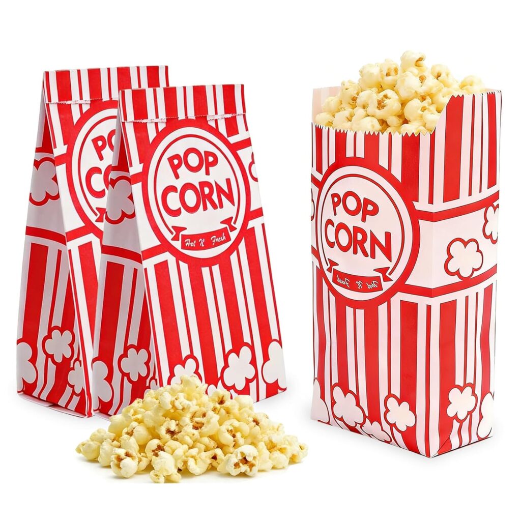 Empty popcorn bags styled for a self-serve popcorn station at a Michael movie night, inspired by Michael Jackson’s legacy and classic cinema snacks.